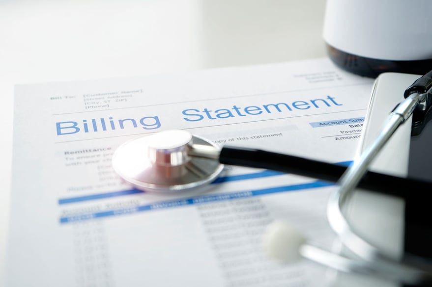 a medical billing statement with stethoscope 