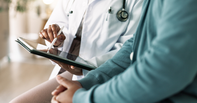 Physician with clipboard treating patient. Can I open a clinic without being a doctor